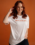 Woman wears Free to be you Brighter day white tee